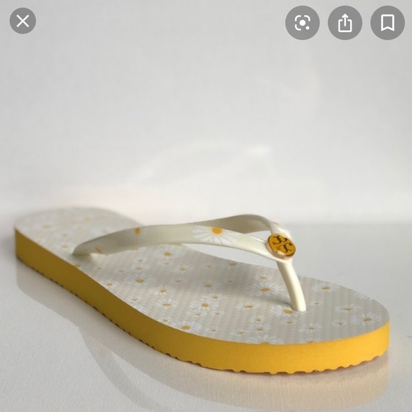tory burch daisy flip flops